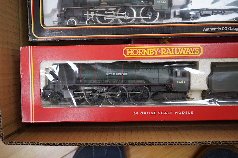 Six boxed 00 gauge railway locomotives by Hornby Railways, etc. including; a BR Class B17/4 (R.133), a BR Coronation Class, a BR Class A4 (R.350), an LNER Class B12/3 (R.150), a BR Class 9F (R.550) and a BR Patriot Class